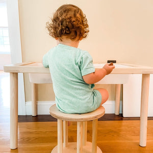 RAD Grow Stool Toddler Sitting on Grow Stool