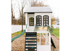 2mamabees reign two story playhouse with slide and swing black and white two story playhouse