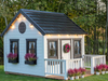 Whole Wood Playhouses Blackbird white with black trim corner view