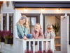 Whole Wood Playhouses Blackbird white with black trim  lifestyle