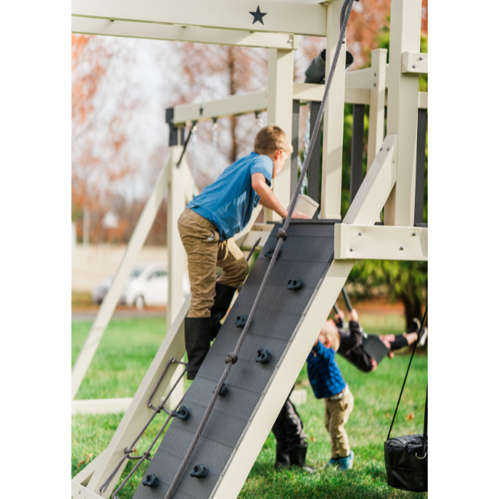 comet swing set rock wall