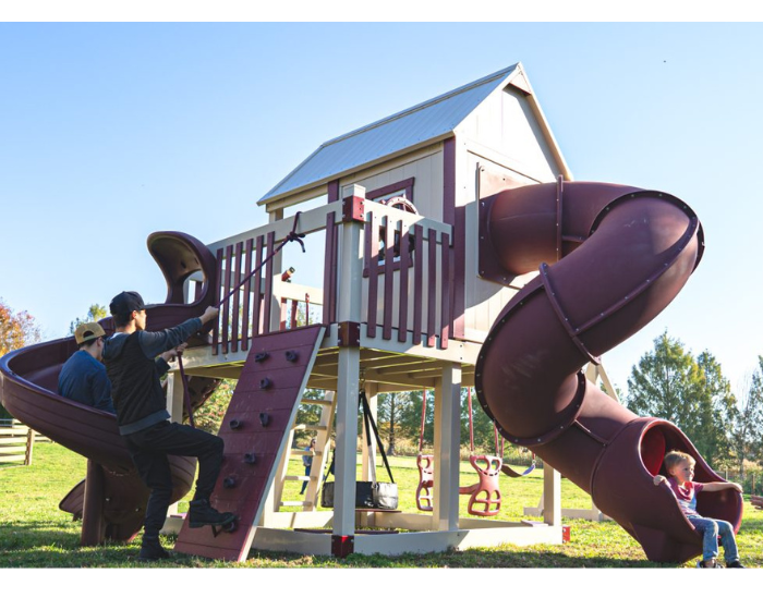 Orion’s Hideout Vinyl Swing Set with Playhouse back view