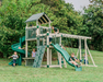 Children playing on a green and beige playset in a park with trees in the background. super star playset