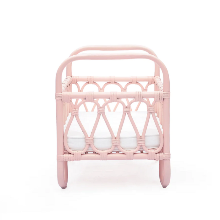 Ellie & Becks Co. Petit Doll Crib in Rattan Pink Side View